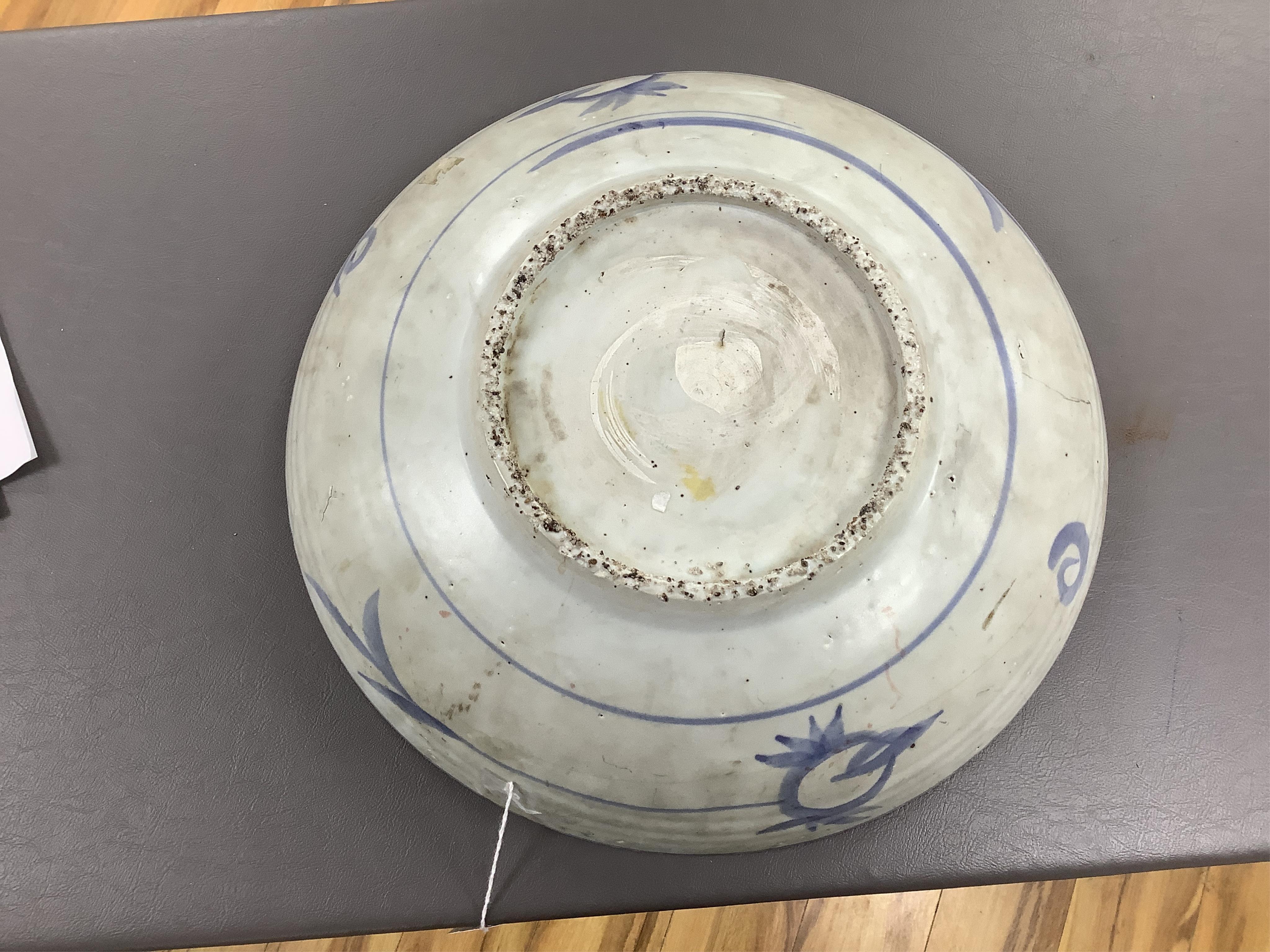 A Chinese Ming Swatow ware blue and white dish, Zhangzhou, early 17th century, 36cm diameter